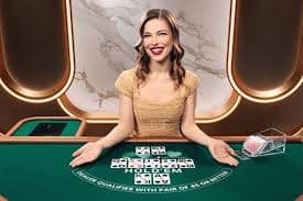 Live Cambodia Pools dealer broadcasting from studio with multiple camera angles and game interface overlay